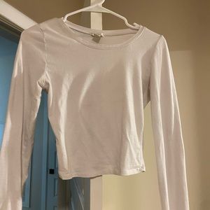 white slightly cropped long sleeve shirt